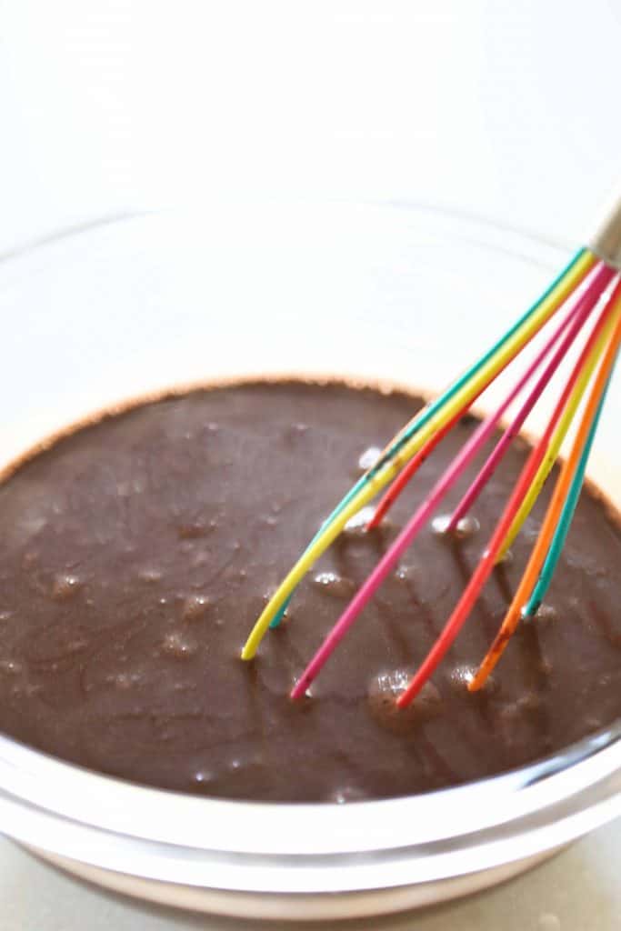 the mixed chocolate cake batter in a glass bowl