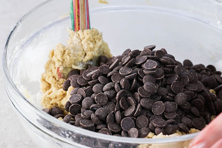 The chocolate chips added to the bowl with the blondie dough