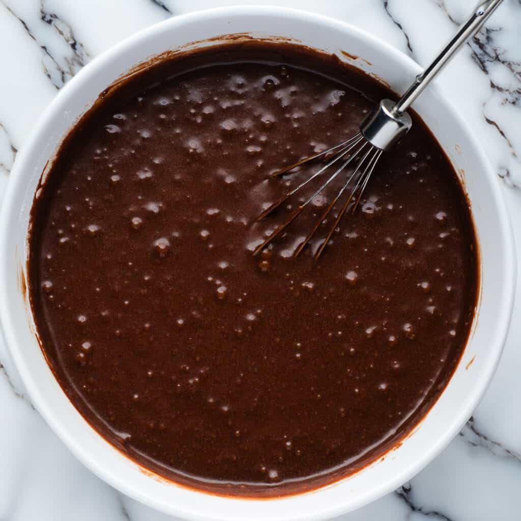 the Devil's Food Cake batter mixed in a white bowl.