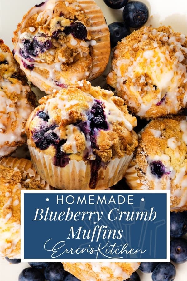 A close-up of homemade Blueberry Crumb Cake Muffins with a crumbly topping and drizzle of icing, surrounded by fresh blueberries. A label reads: "Homemade Blueberry Crumb Muffins, Erren's Kitchen.
