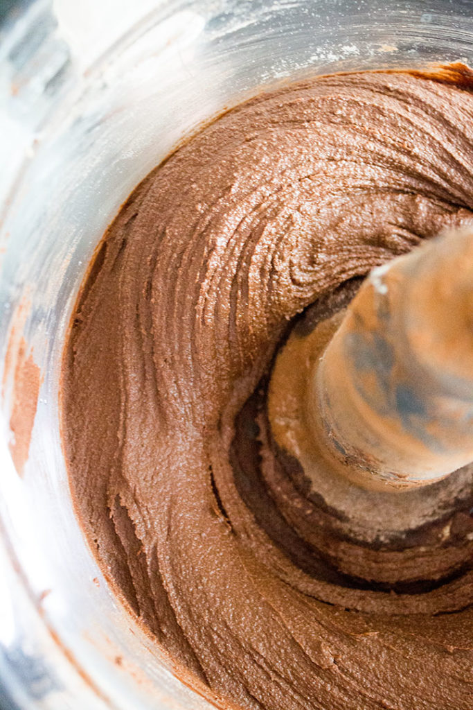 A close up of the dough with the dry ingredients mixed in