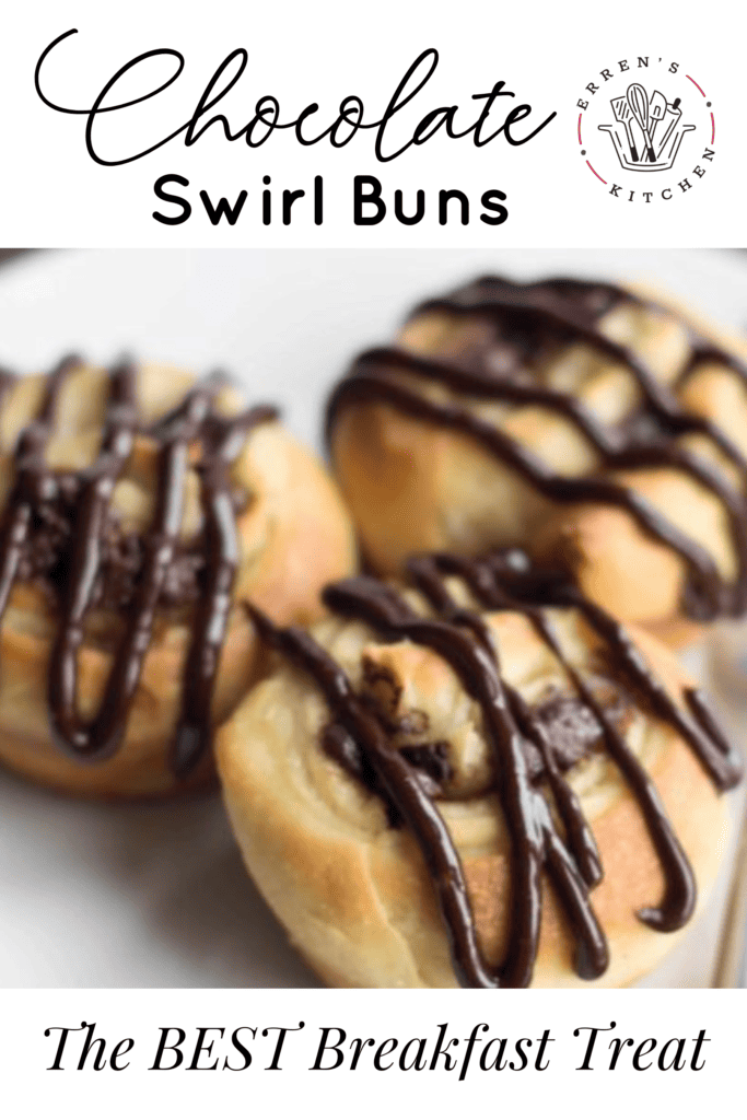 Three soft, rich, buttery buns with a chocolate and cinnamon filling and chocolate drizzled on the top.