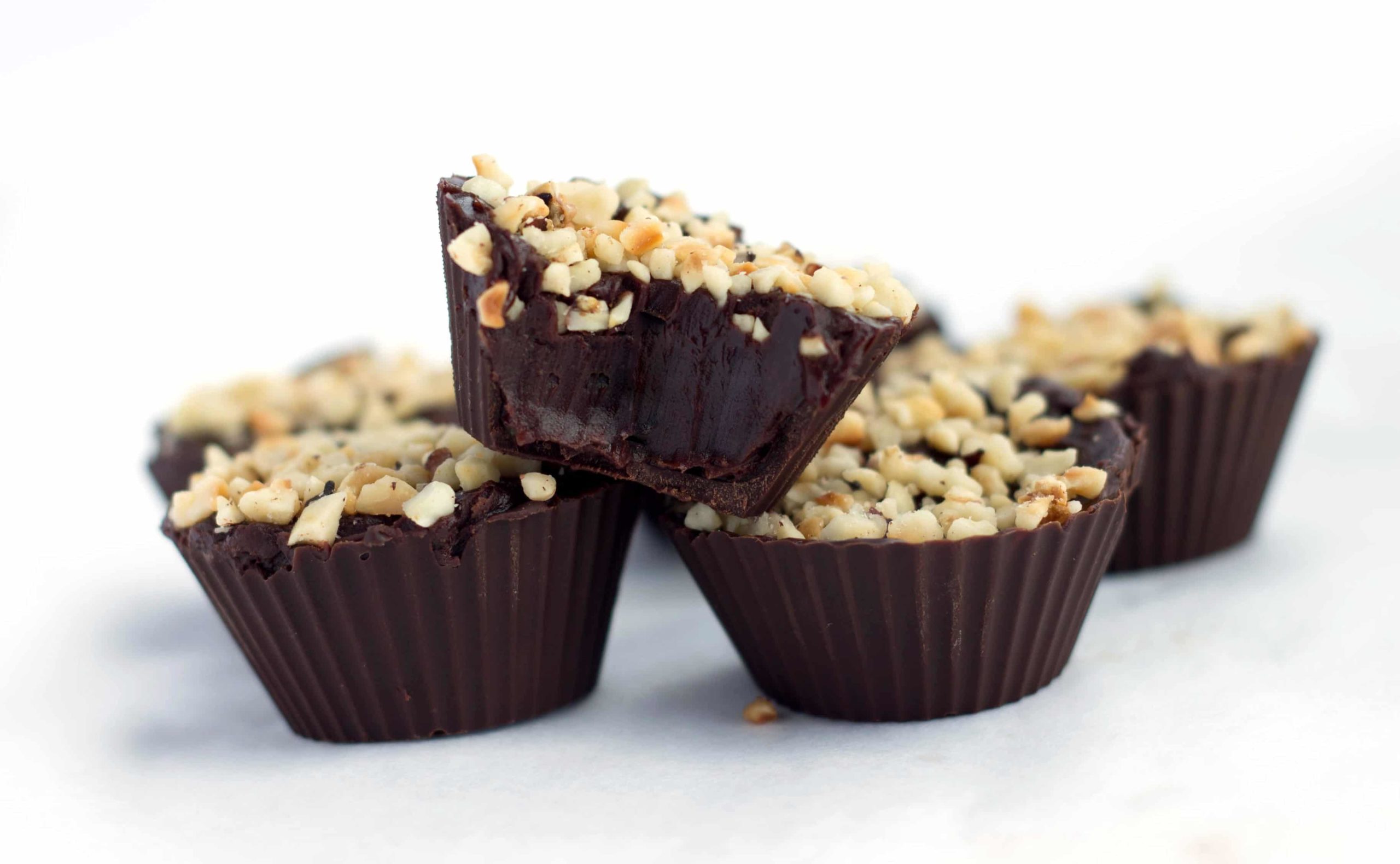 Chocolate Hazelnut Truffle Cups in a pile.