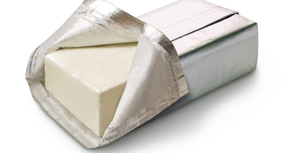 a block of cream cheese with a foil wrapper