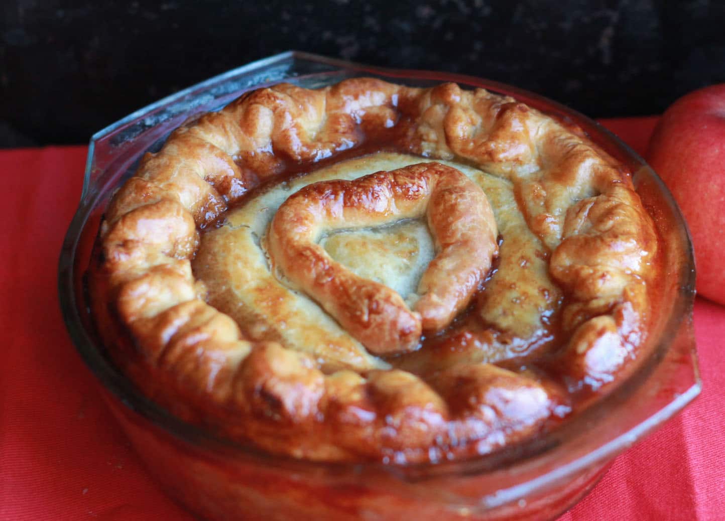 pie gone wrong, liquid leaking onto the pastry topping.