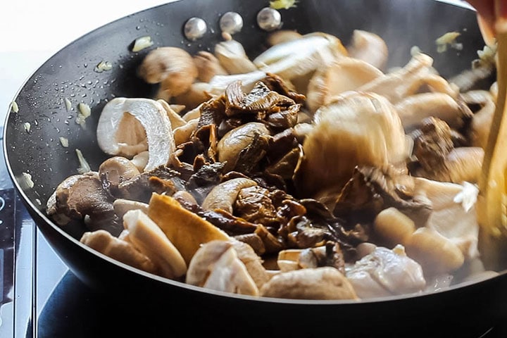 The re-hydrated, dried mushrooms added to the chicken and fresh mushroom mixture