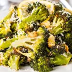 A close up of a plate of food with broccoli