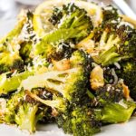 A close up of a plate of food with broccoli
