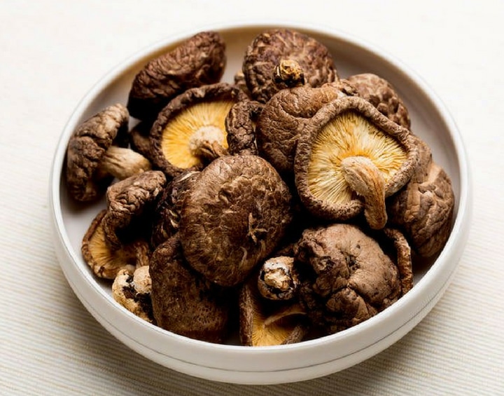 a bowl of dried Chinese mushrooms