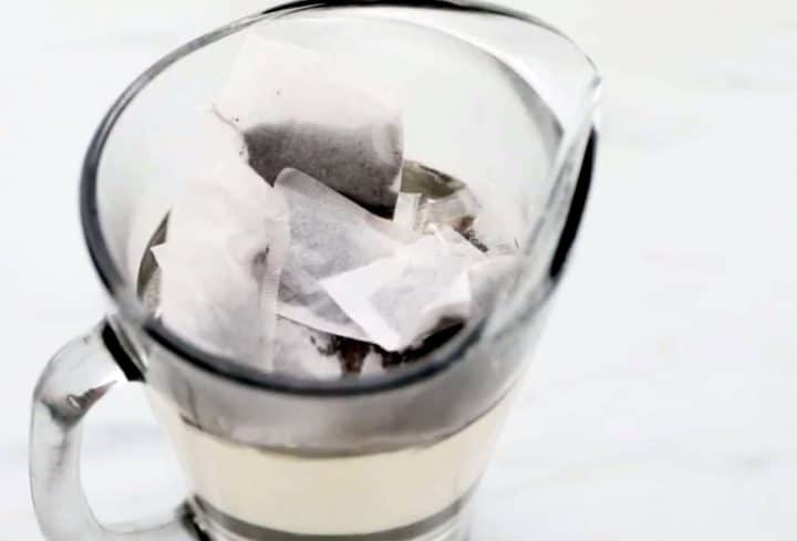 The tea bags added to the pitcher