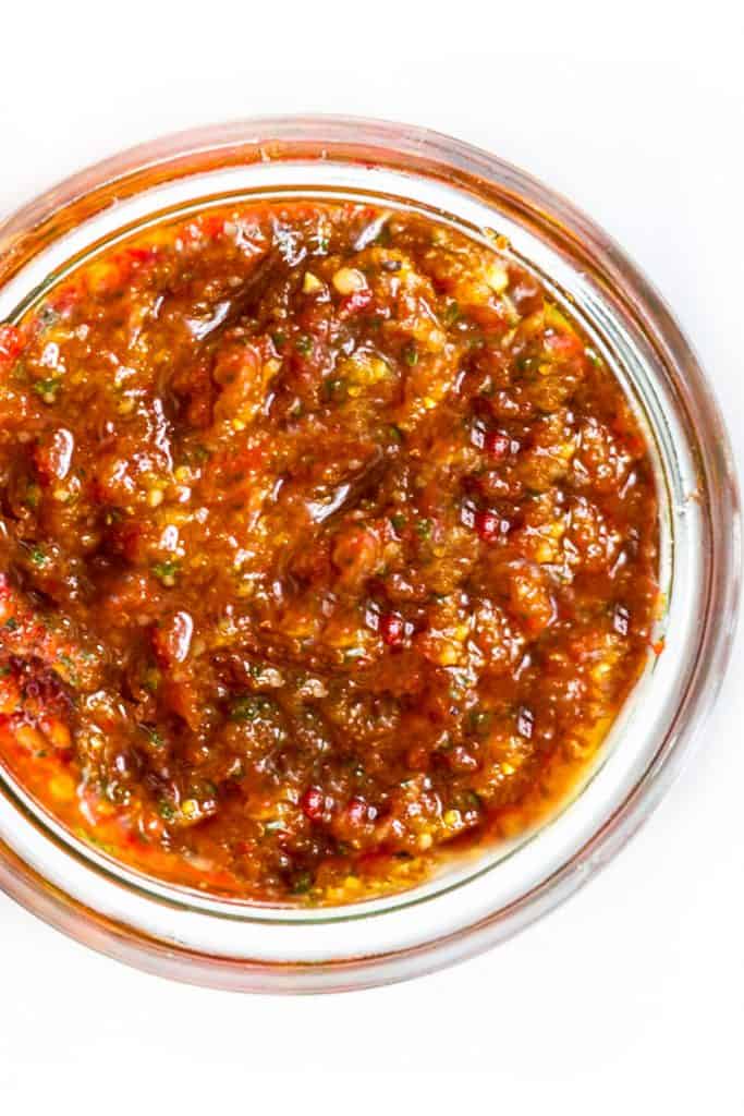 a jar of red pesto from above