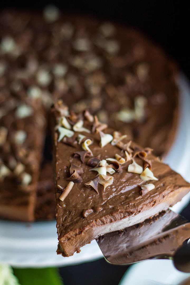 A slice of the Rich & Creamy No Bake Chocolate Torte being served