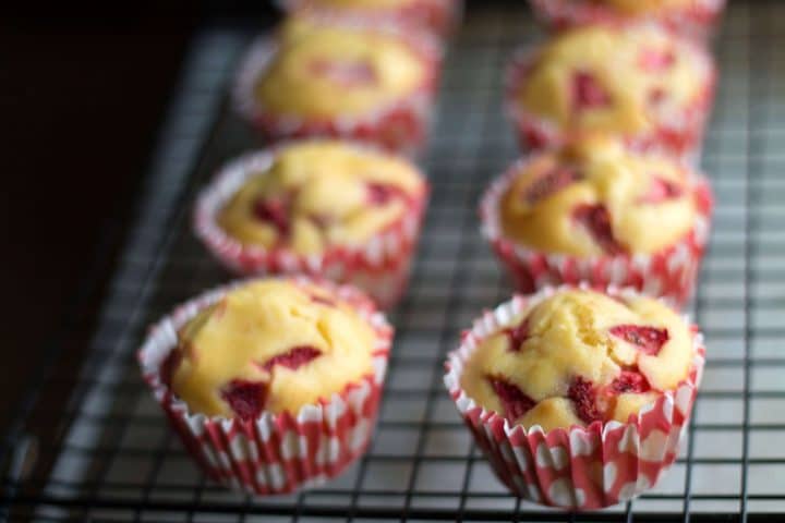 strawberry honey cornbread muffins cooling on a cooling rack.