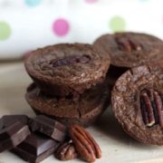 Triple Chocolate Brownie Bites ready to eat with chunks of chocolate next to them