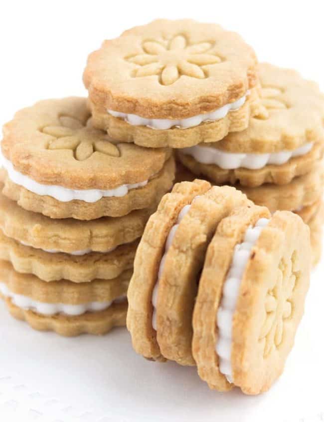 A close up of golden oreo cookie stacks