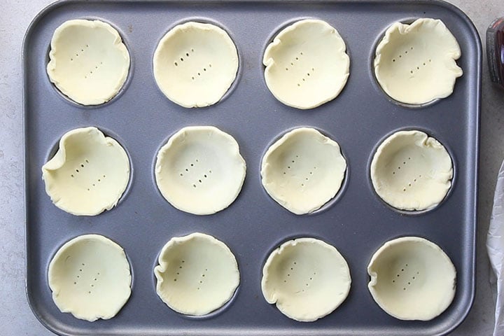 The puff pastry rounds added to the pan