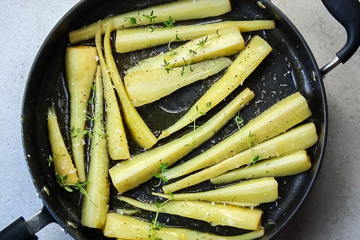 The parsnips, coated in honey, maple syrup, seasoning and thyme