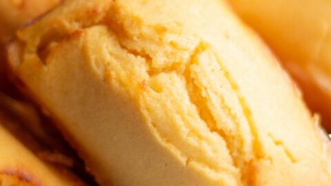 A close up sweet cornbread loaves in a basket