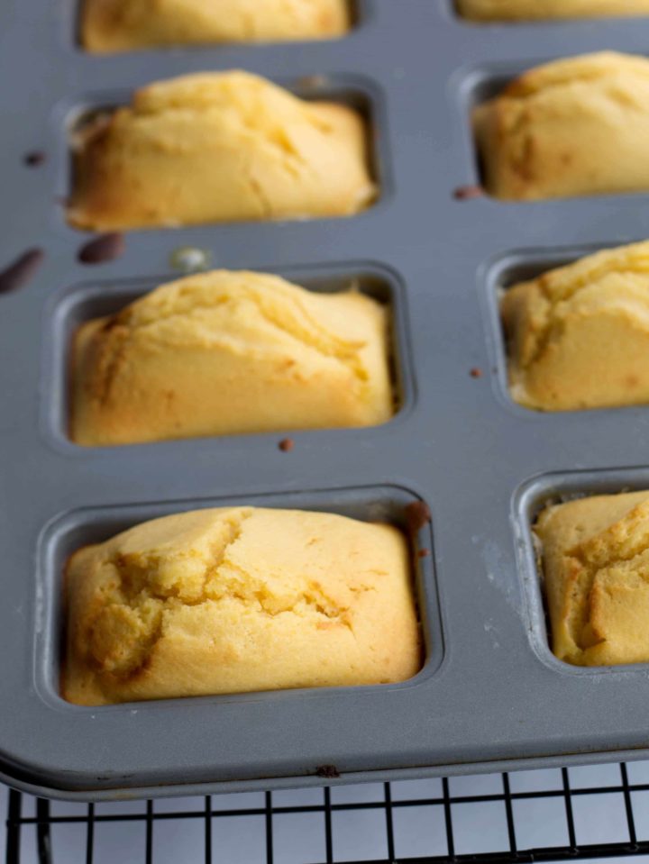 The Mini Honey Cornbread loaves fresh from the oven and still in the pan