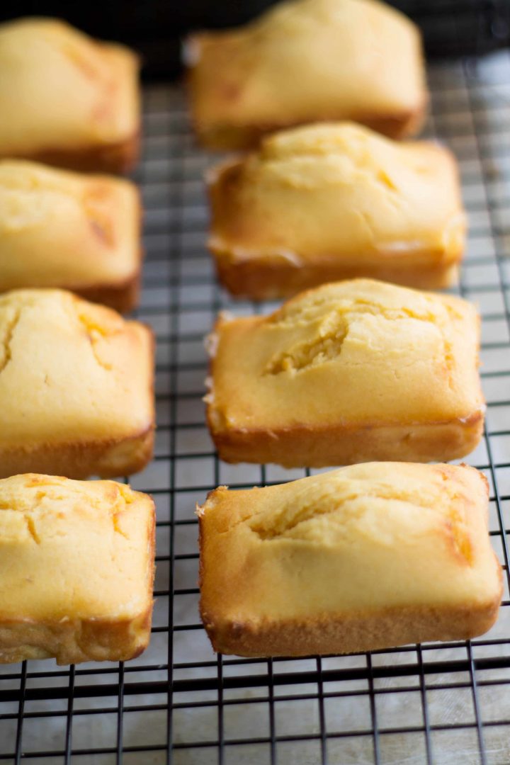 Mini Honey Cornbread loaves cooling on a wire rack