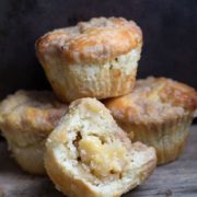 A close up of a pile of cheesecake muffins