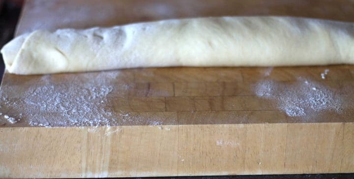 dough rolled up ready to cut