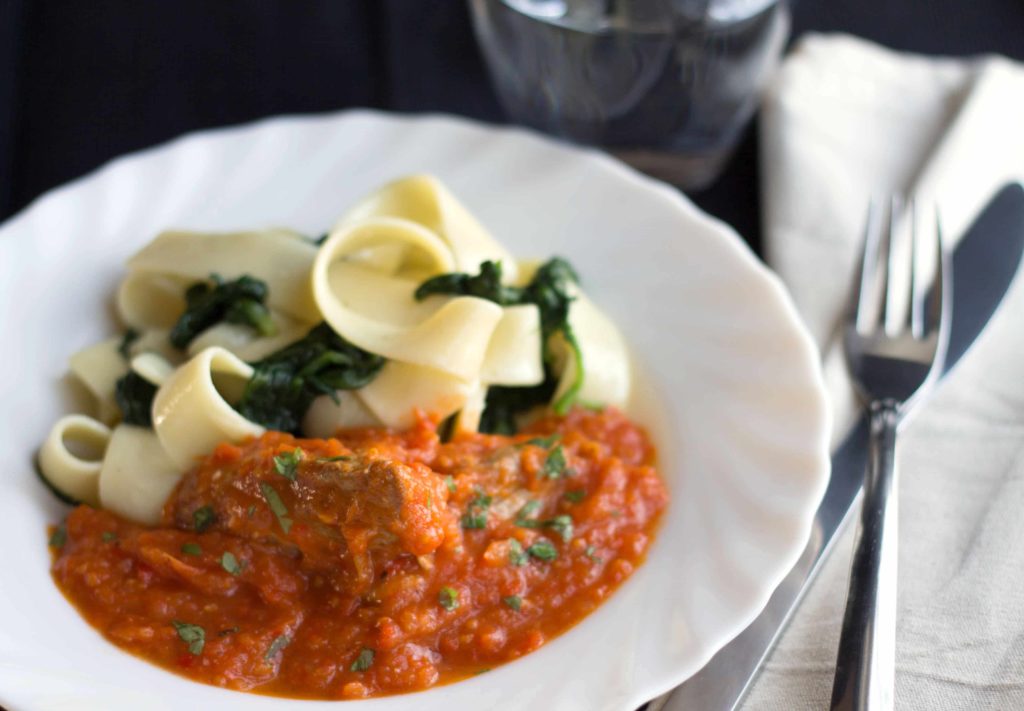 Sicilian Lamb - Erren's Kitchen - This recipe is cooked in a fresh tomato & red pepper sauce. It's packed with flavor and and the perfect pick-me-up on a cold day.