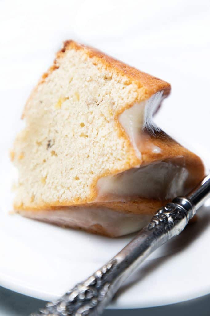 A slice of cake on a plate with a fork