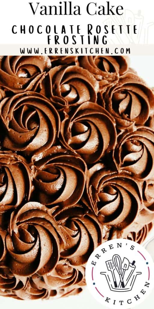 a cake covered in chocolate frosting rosettes