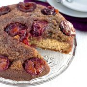 plum upside-down cake with a slice taken out