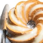 Bundt Cake with Cream Cheese Icing on acooling rack