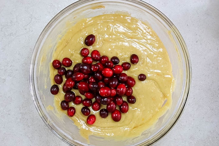 Cranberries added to the batter in the bowl