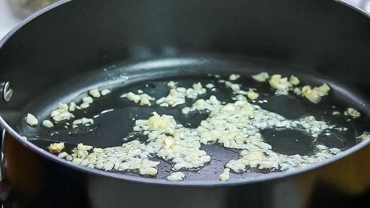 Garlic cooking in olive oil