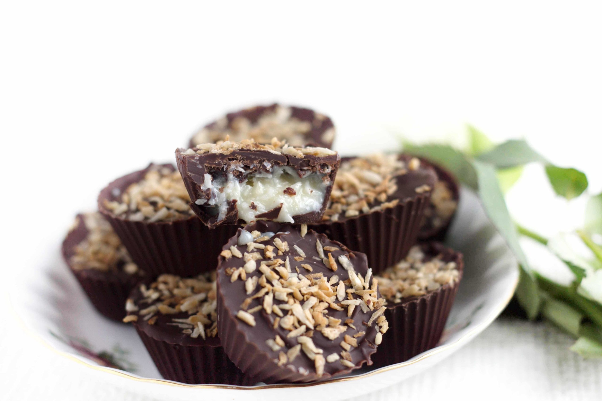 a plate of homemade coconut mounds ready to eat