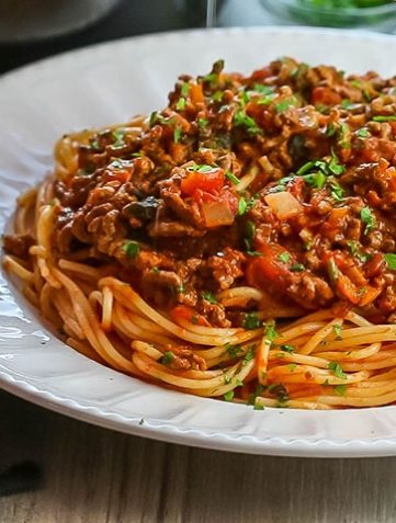 A close up photo of Quick & Easy Spaghetti Bolognese on a plate.