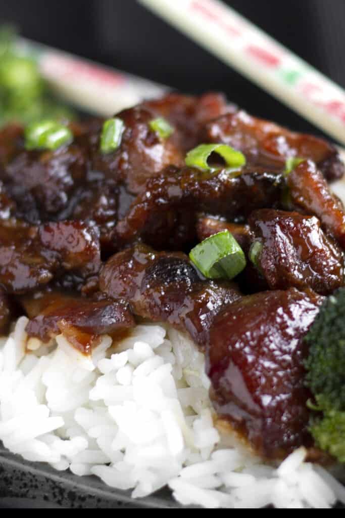 a close up photo of on a black plate