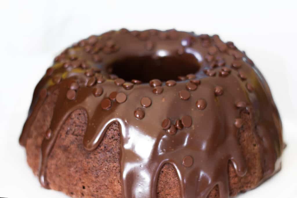 A Chocolate Bundt Cake with a cake topped with chocolate chips