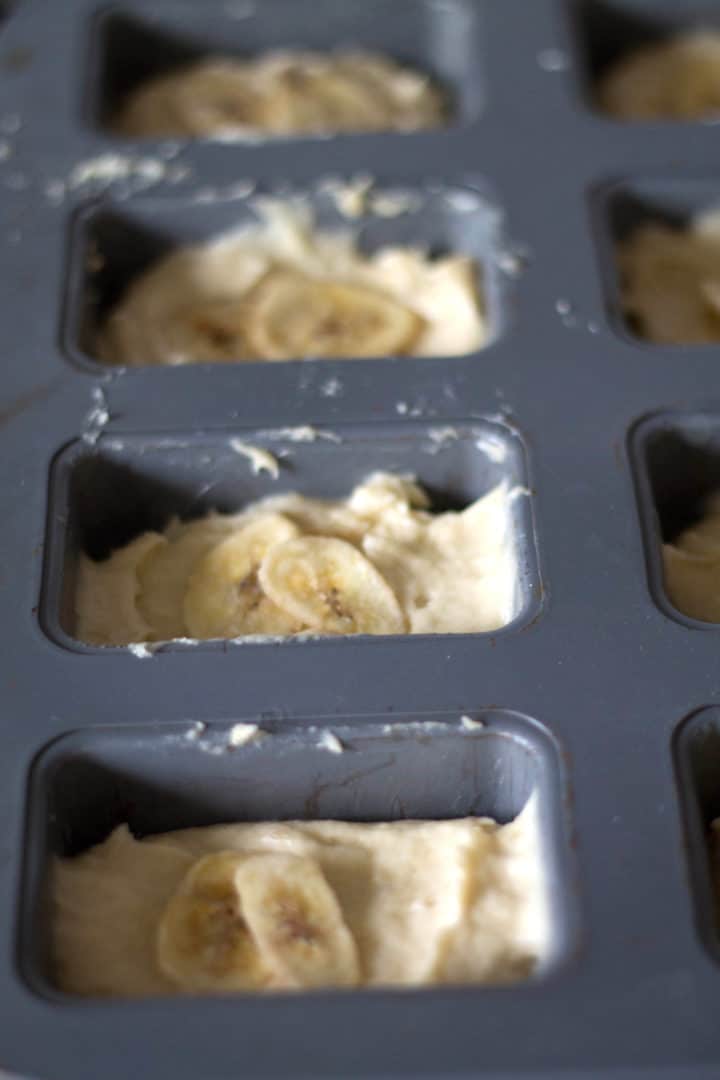 Mini Banana Bread batter in pan ready to bake