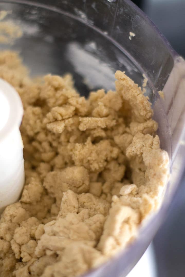 pastry being mixed in a food processor
