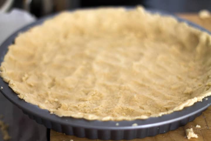 pastry pressed into a circular pie tin