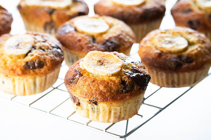 chocolate chip banana muffins cooling on a cooling rack