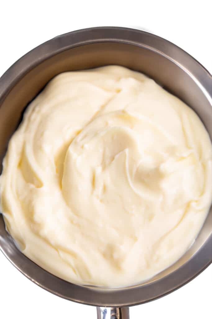 The thickened custard in a saucepan