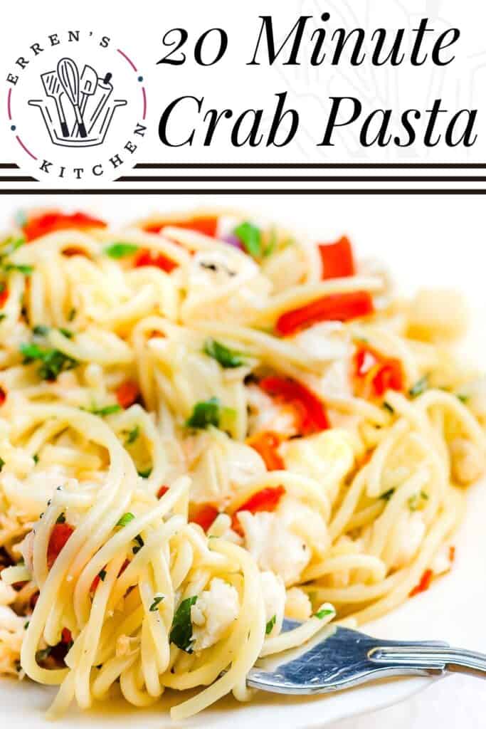 a pinterest pin the Crab Pasta on a white plate with a fork twirling the spaghetti laying on the plate