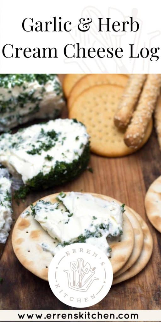 garlic and herb cream cheese log served on crackers