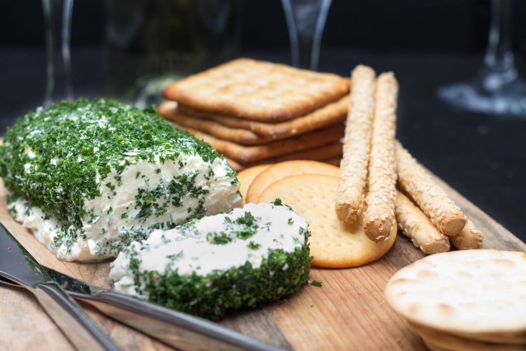 garlic and herb cream cheese log ready to serve