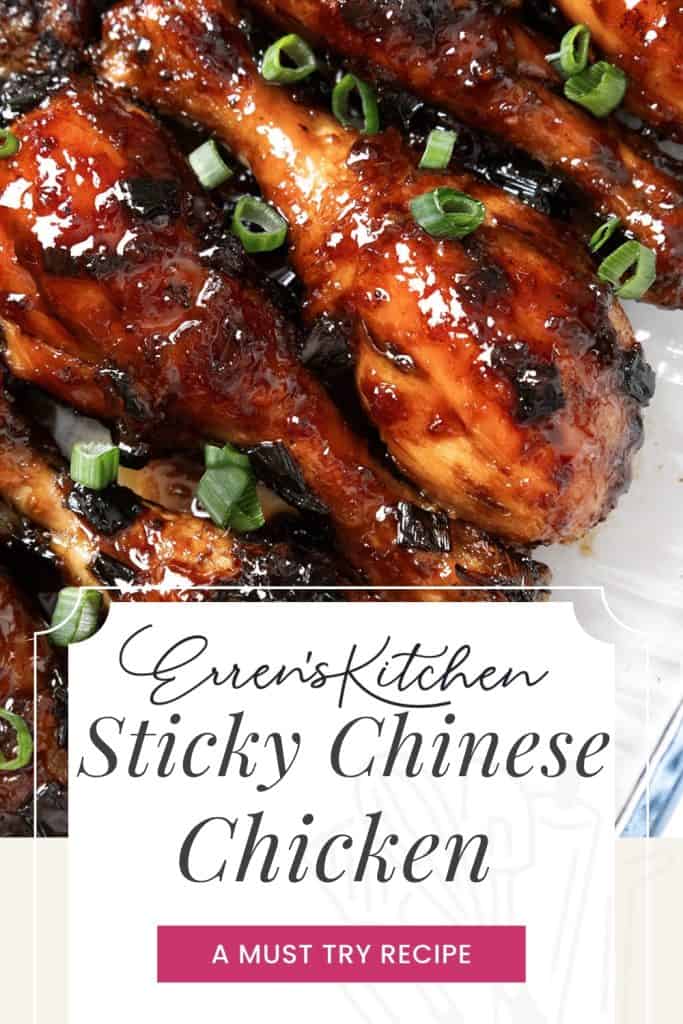 Close-up of glazed Sticky Chinese Chicken drumsticks topped with chopped green onions on a white plate. Text overlay reads “Erren’s Kitchen Sticky Chinese Chicken. A must try recipe.”.