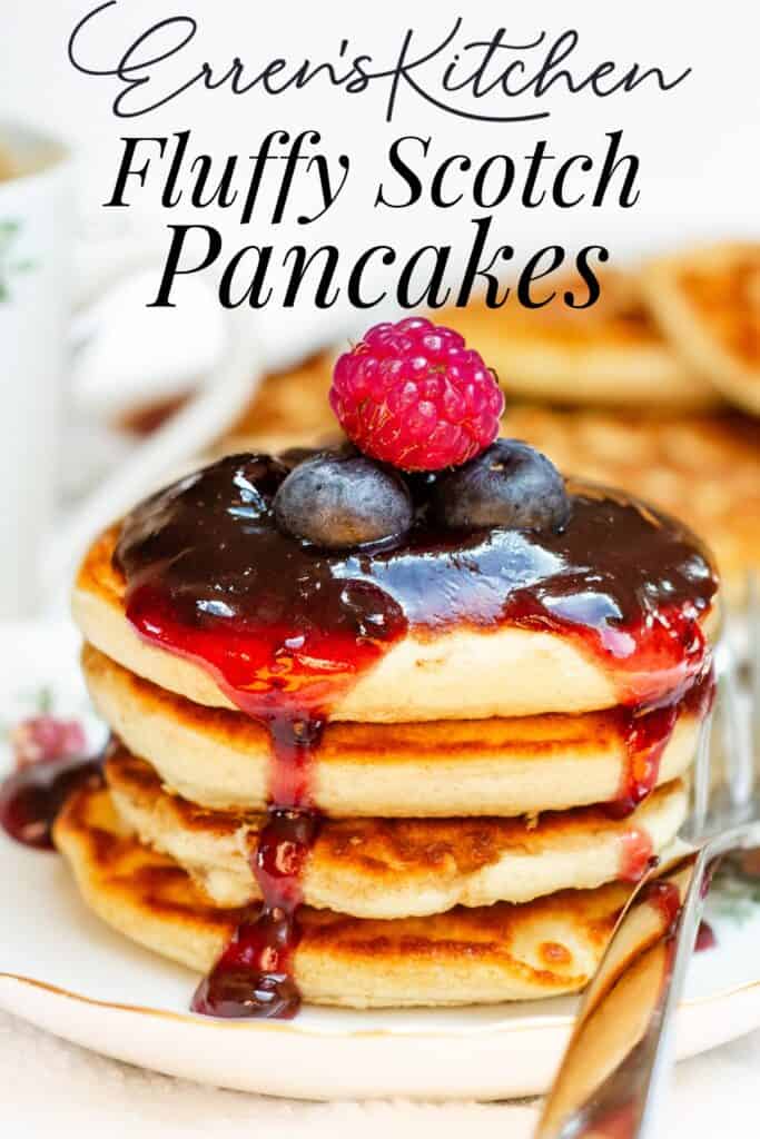 A promotional image featuring "Erren's Kitchen Fluffy Scotch Pancakes" - a stack of pancakes with a glossy berry sauce and a garnish of fresh raspberries and blueberries, with text overlaying the top of the image.