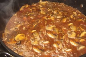 The tomatoes added to the sauce with the mushroom mixture