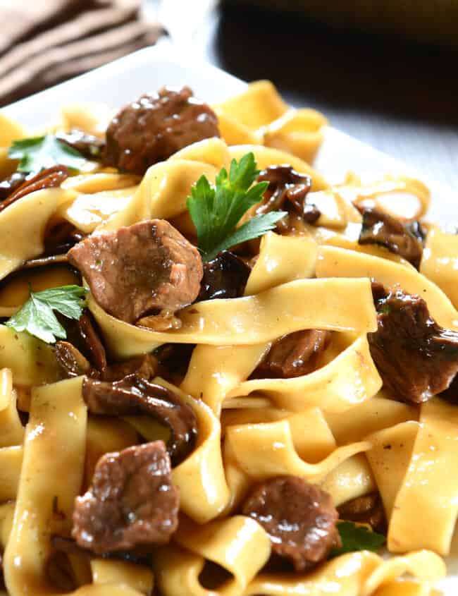 pasta with beef and mushrooms on a plate
