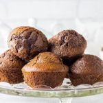 Double Chocolate Chip Muffins piled high on a serving dish